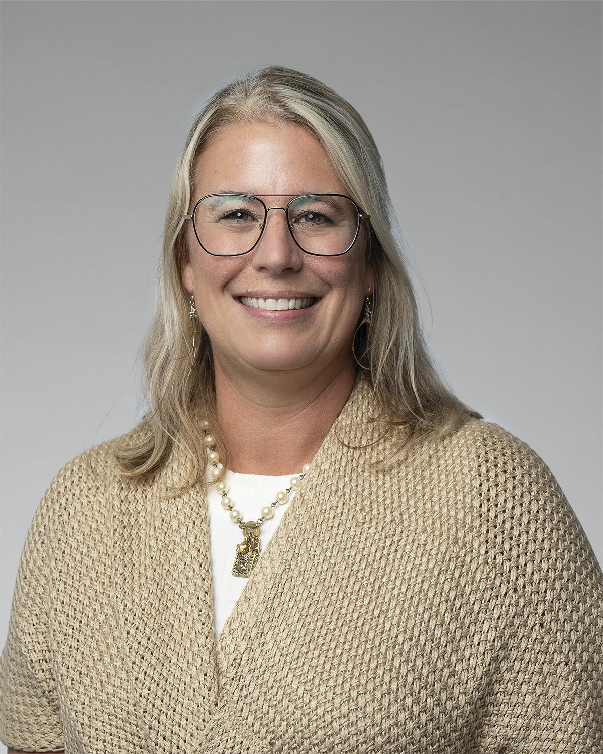 Headshot Image for Kelly Necessary